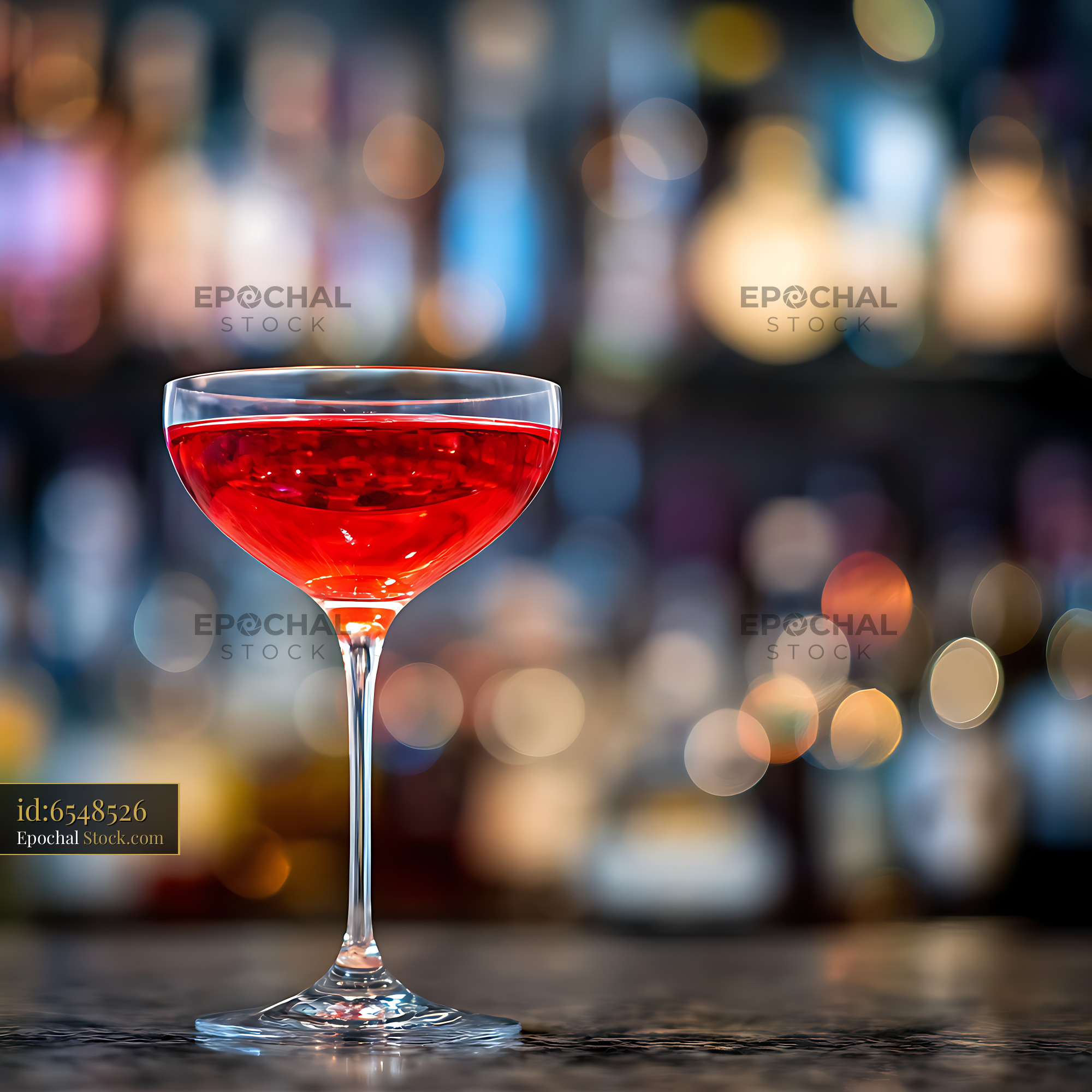 Red Cocktail in Coupe Glass at Bar - stock photo