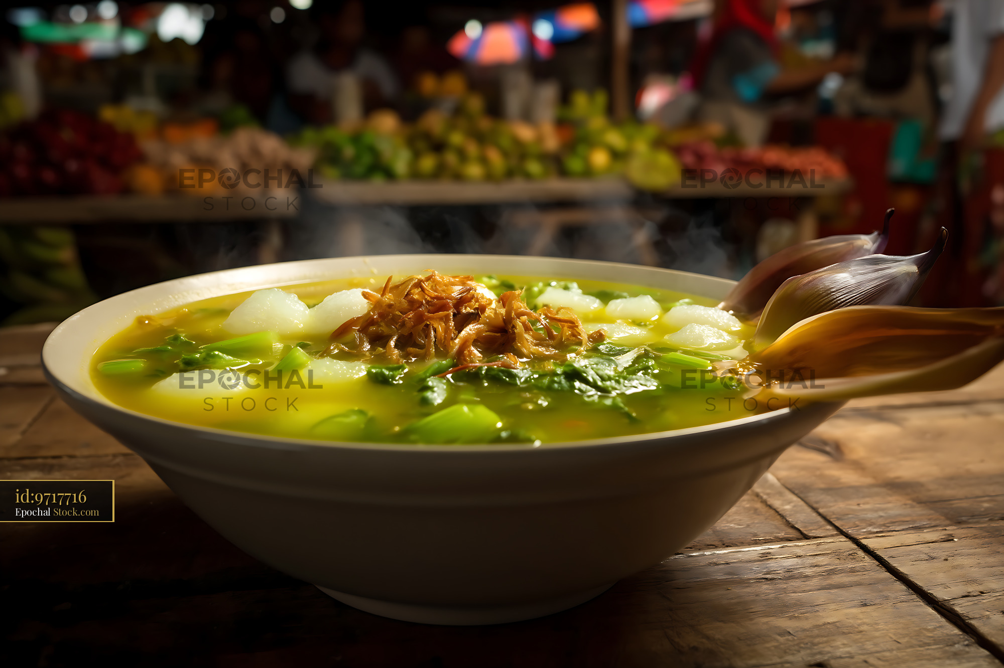 Steaming Kapurung Soup with Greens at Market Stall - stock photo