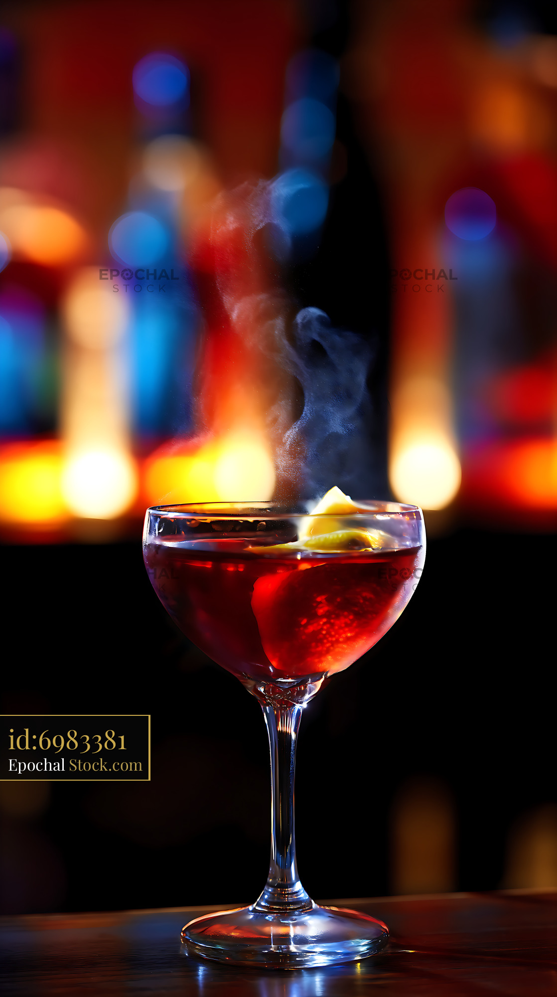 Smoky Red Cocktail with Lemon in Vibrant Bar Light - stock photo