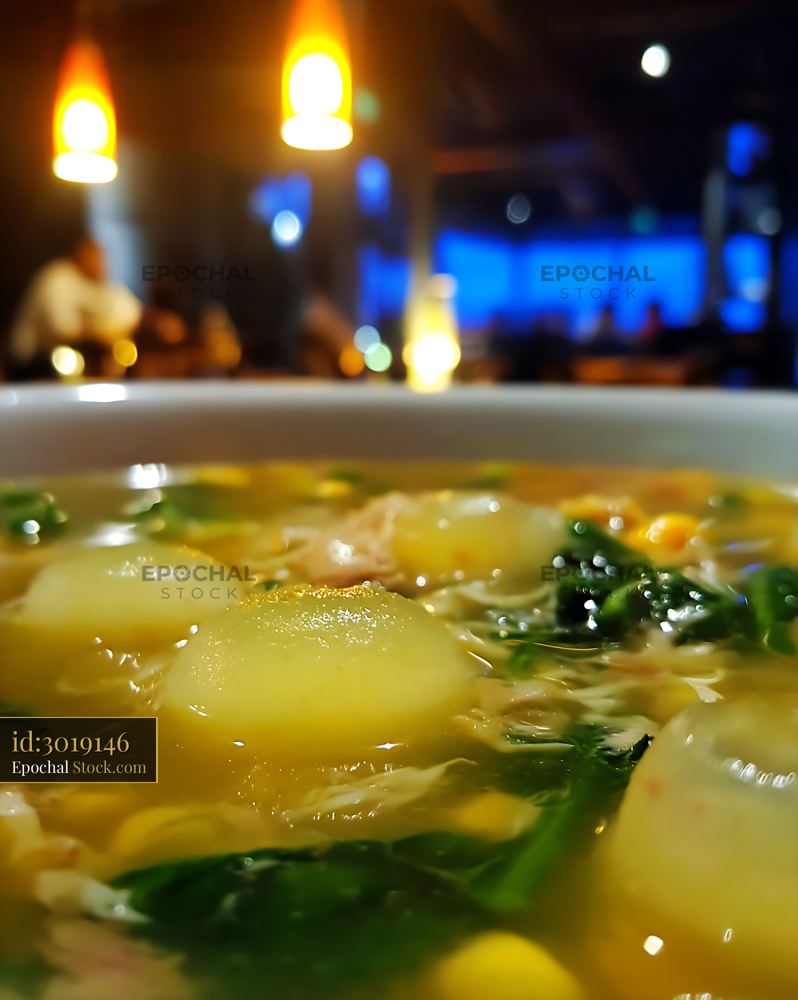 Kapurung Soup with Dumplings and Greens in Restaurant - stock photo