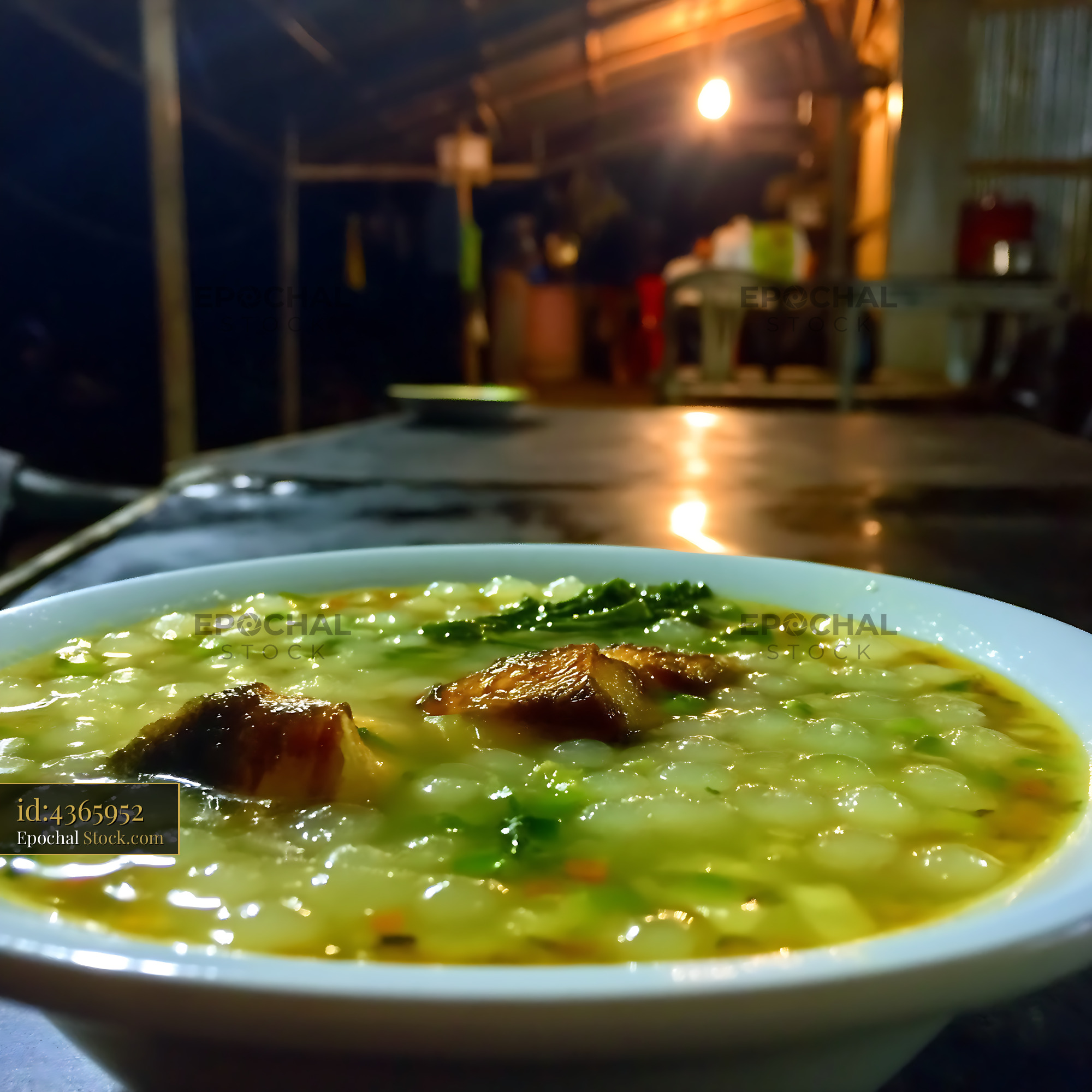 Kapurung Soup [Adobe ] with Fish and Greens at Night - stock photo