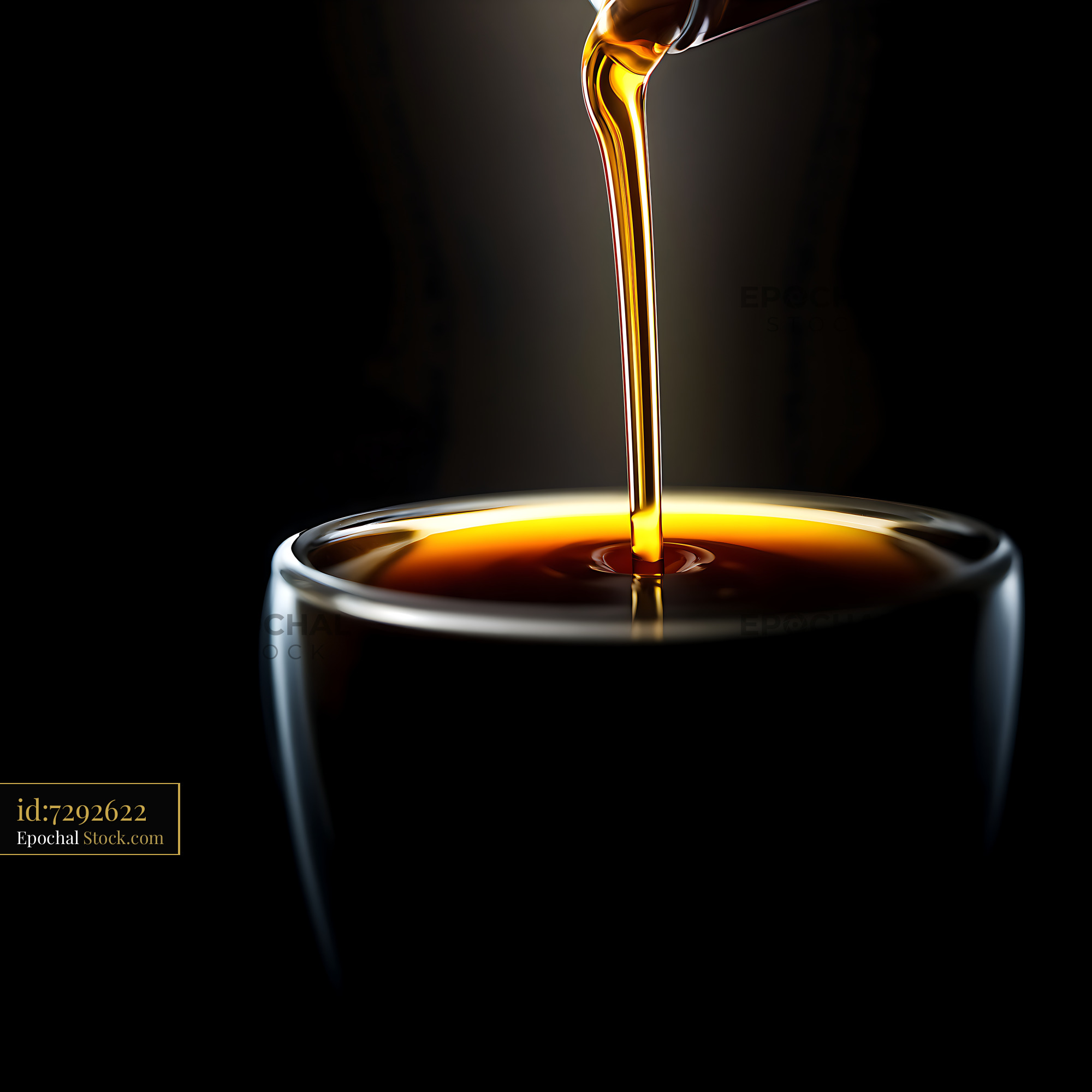 Golden Liquid Pouring Into Clear Glass Container - stock photo