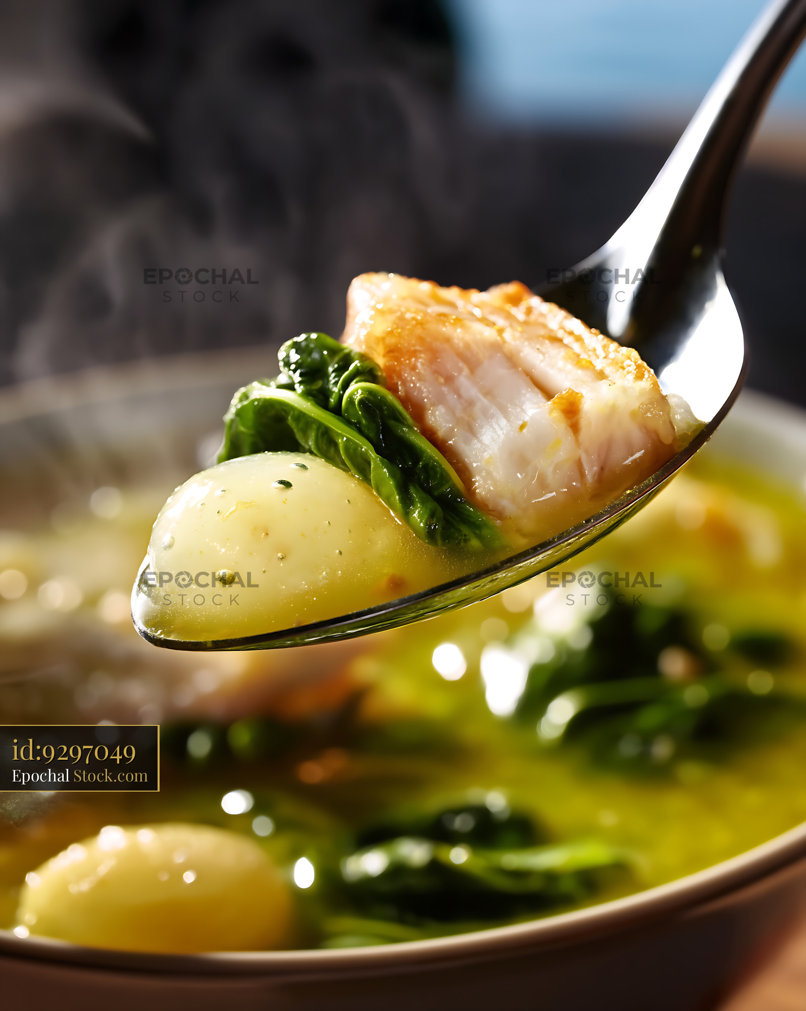 Steaming Lor Mee Soup with Fish, Potato, and Greens - stock photo