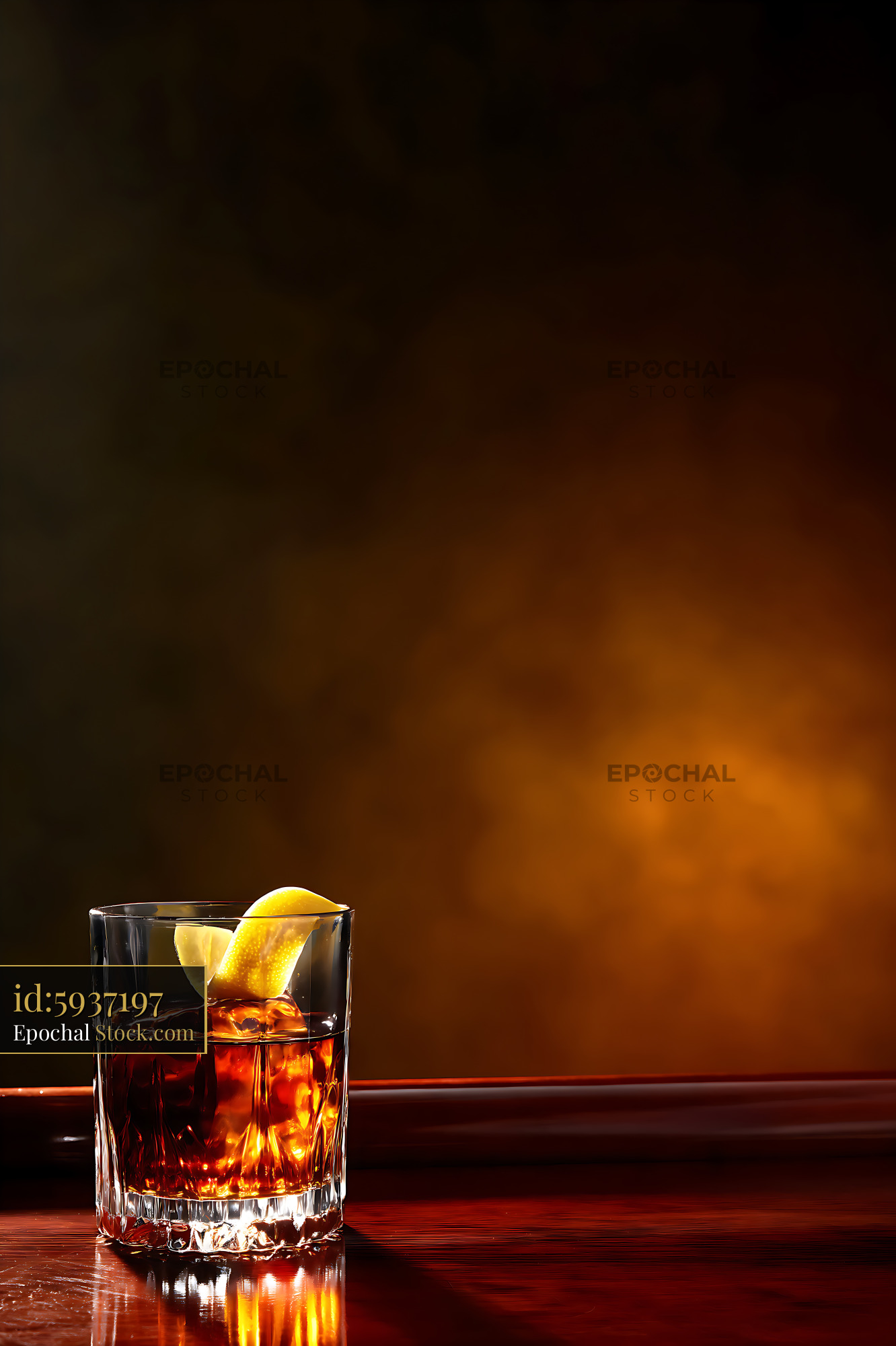 Whiskey Cocktail with Lemon Twist on Bar - stock photo