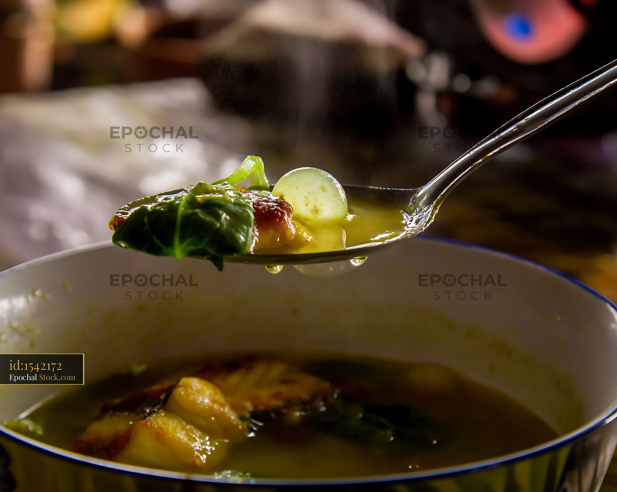 Hot Lor Mee Soup with Fish and Greens on Spoon - stock photo