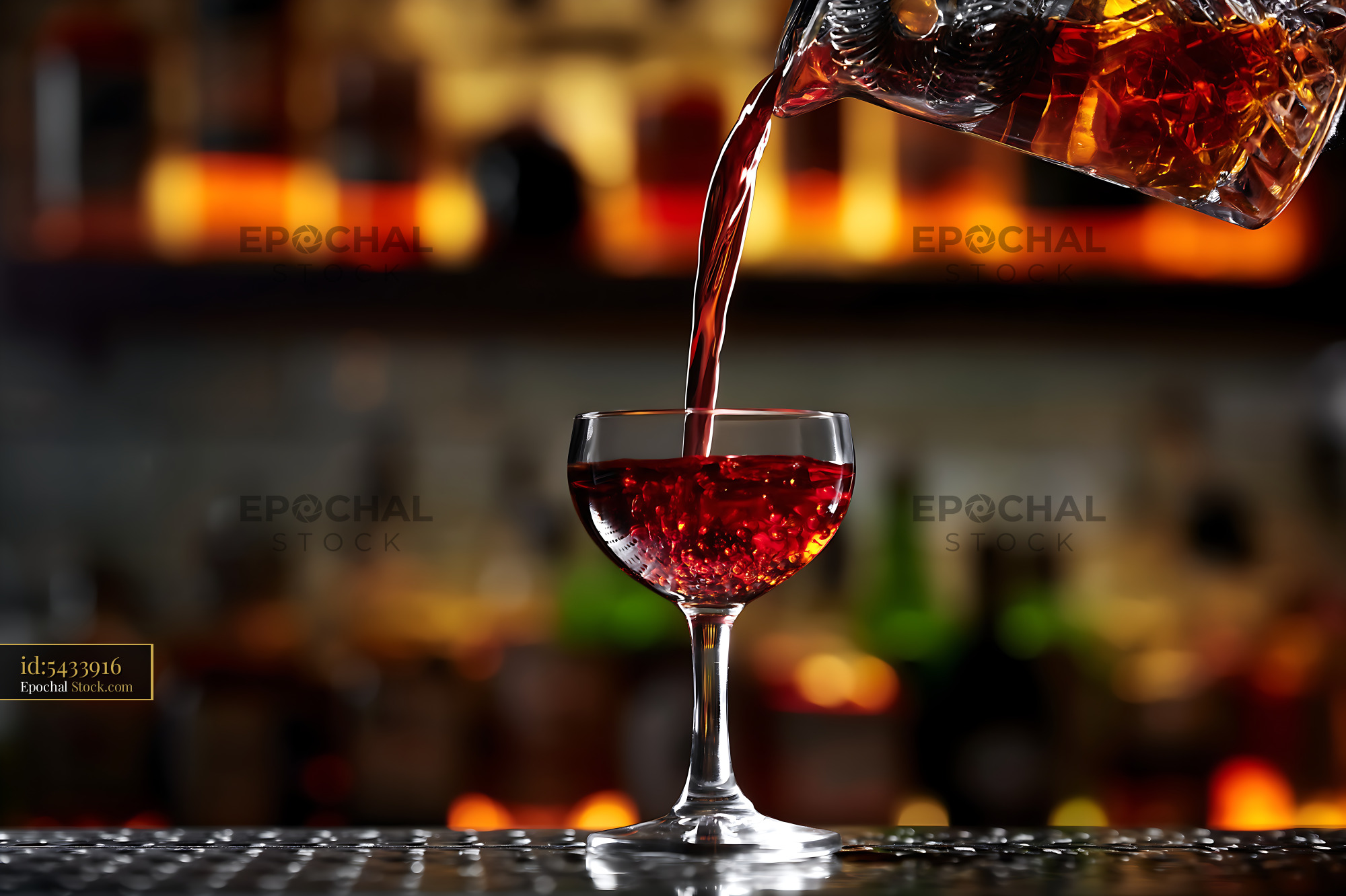 Bushwick Cocktail Being Poured Into Glass - stock photo