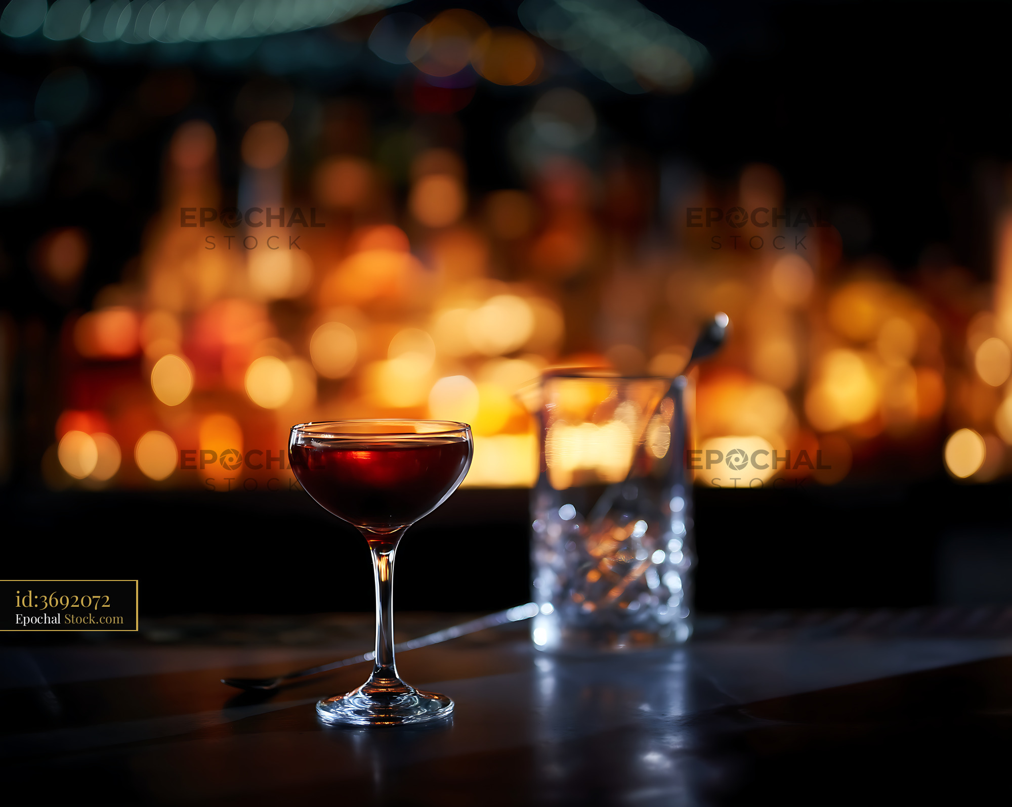 Bushwick Cocktail in Coupe Glass at Bar - stock photo