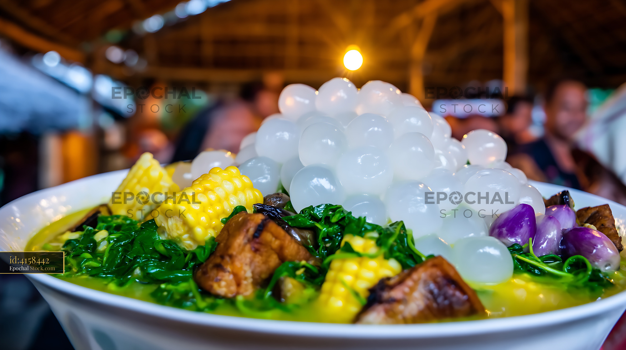 Authentic Lor Mee Soup with Palm Fruit, Corn, and Greens - stock photo