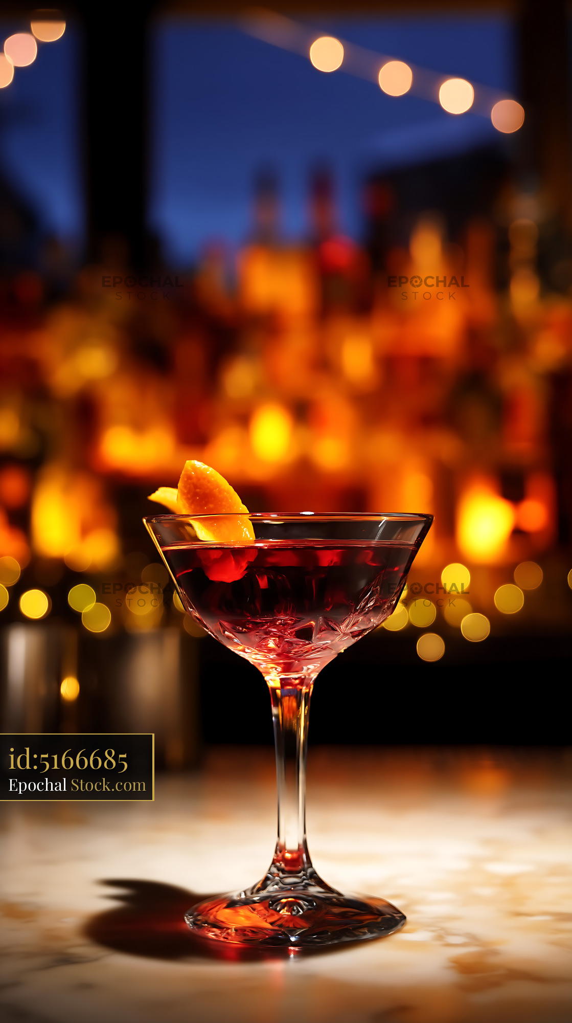 Cocktail with Citrus Garnish at Evening Bar - stock photo