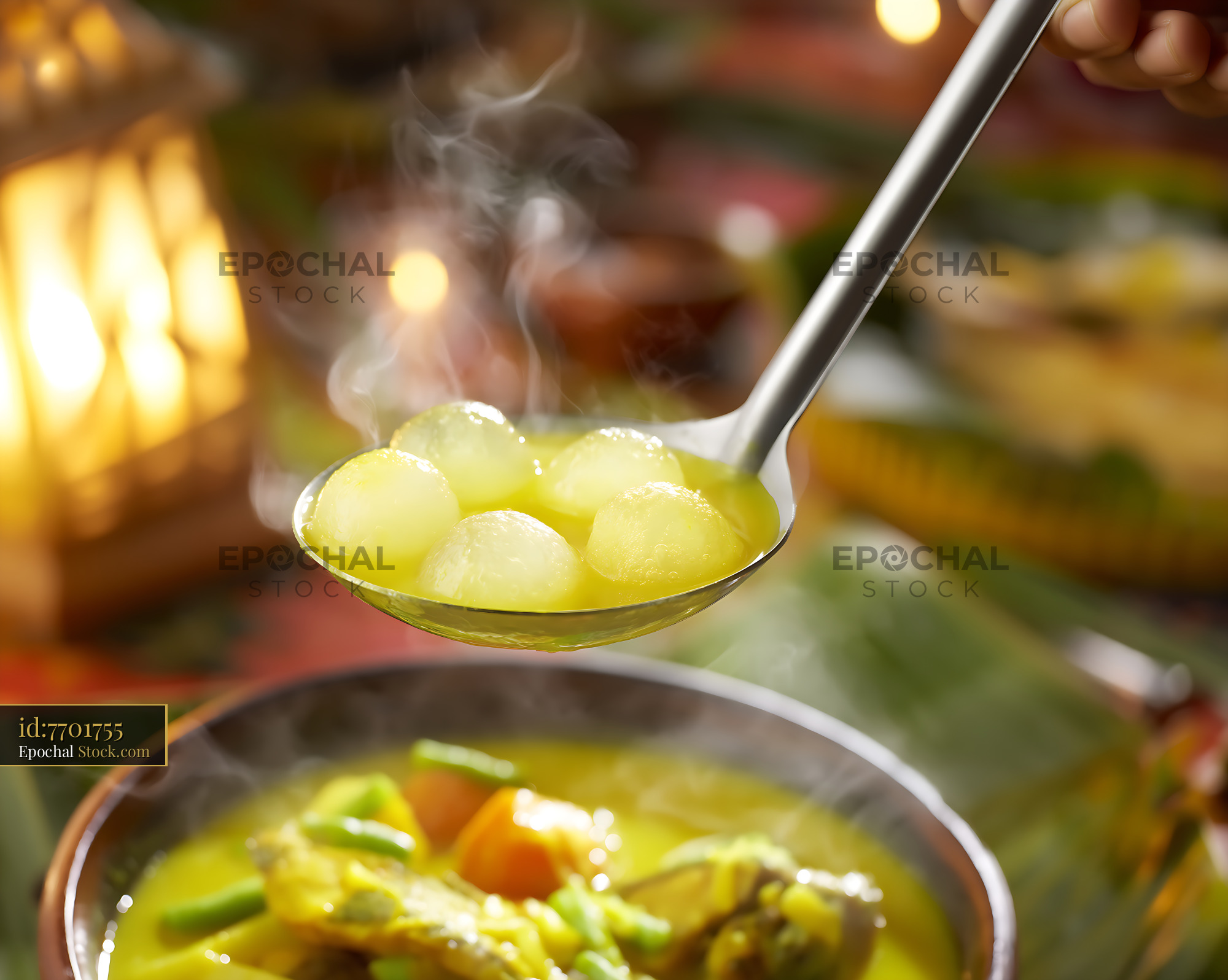 Steaming Kapurung Soup with Sago Pearls in a Ladle - stock photo