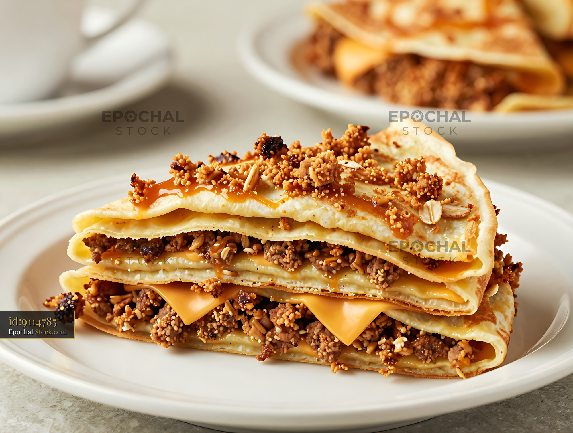 Goetta Crepe Stack with Cheese and Crumb Topping - stock photo