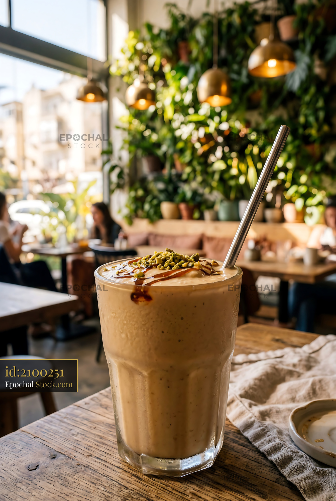 Tahini Date Shake with Pistachio Garnish - stock photo