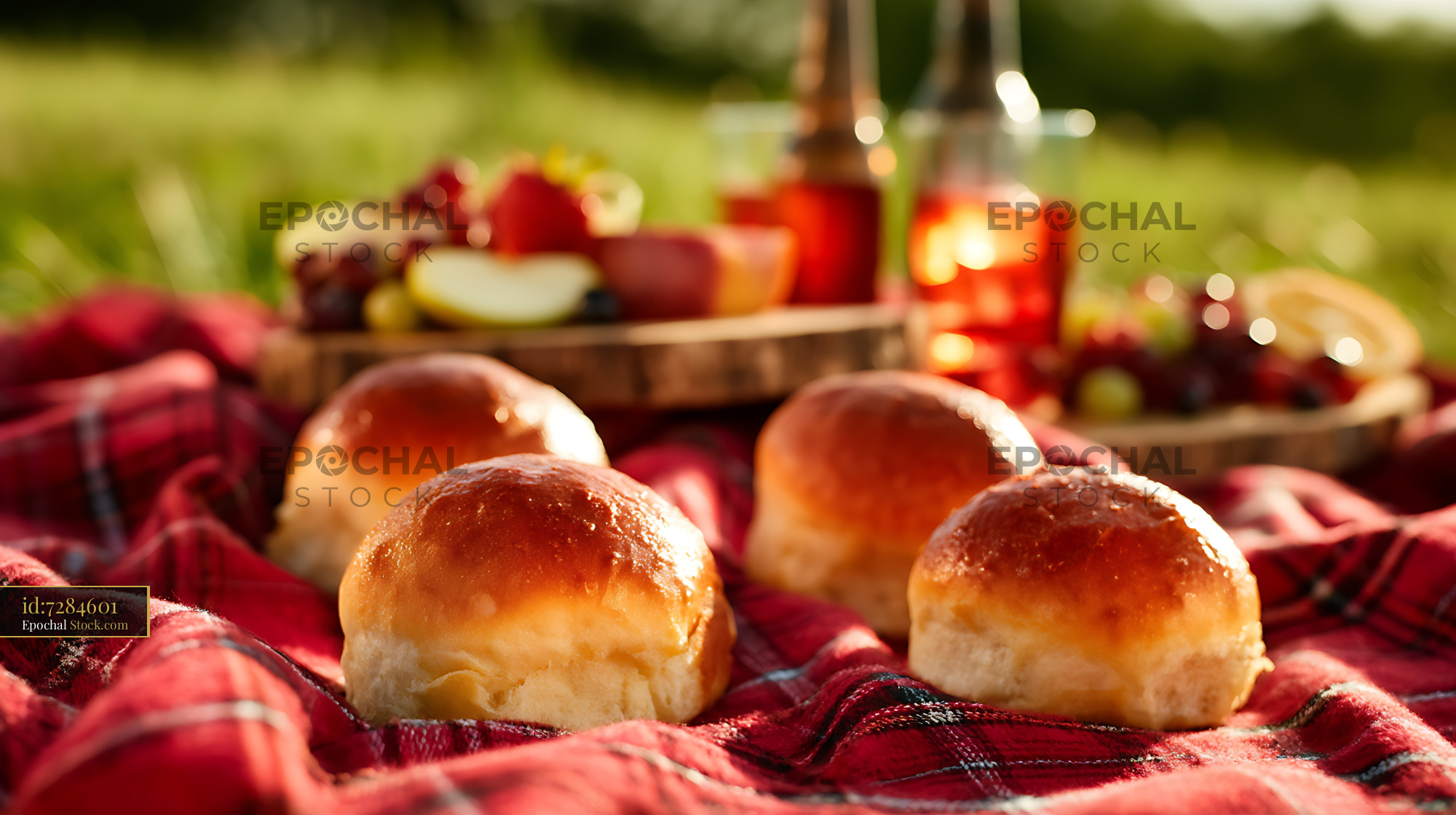 Bierocks with Golden Crust on Rustic Picnic Blanket Spread - stock photo