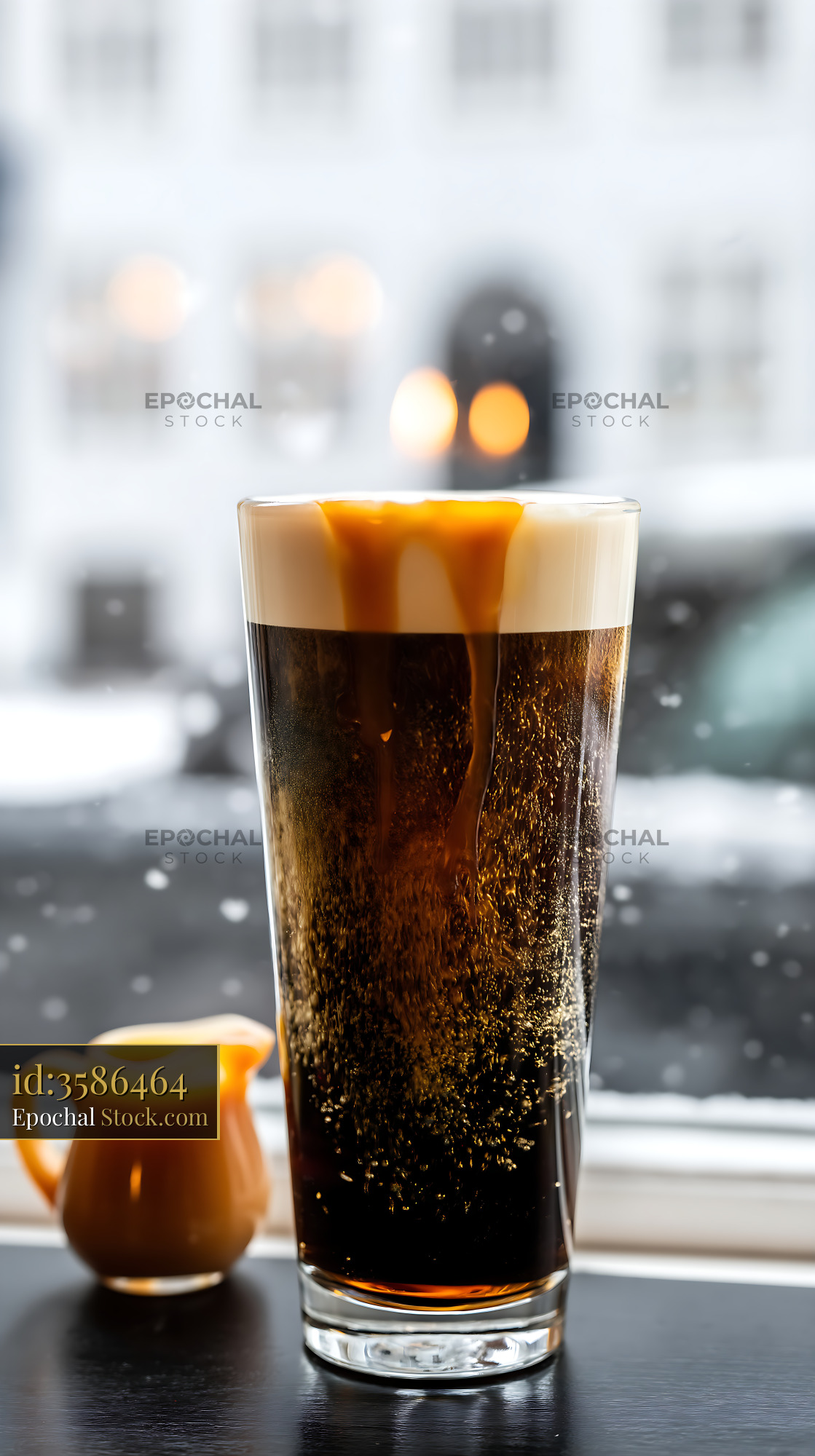 Nitro Caramel Coffee with Winter Ambiance - stock photo