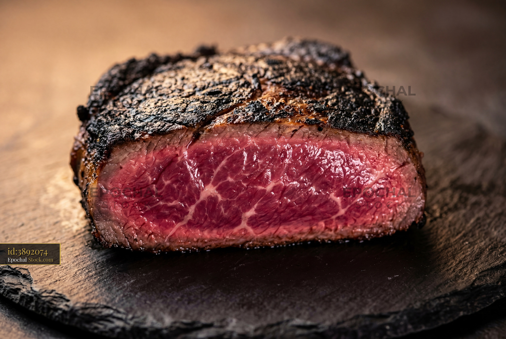 Medium Rare Steak Cross Section Charred Crust - stock photo