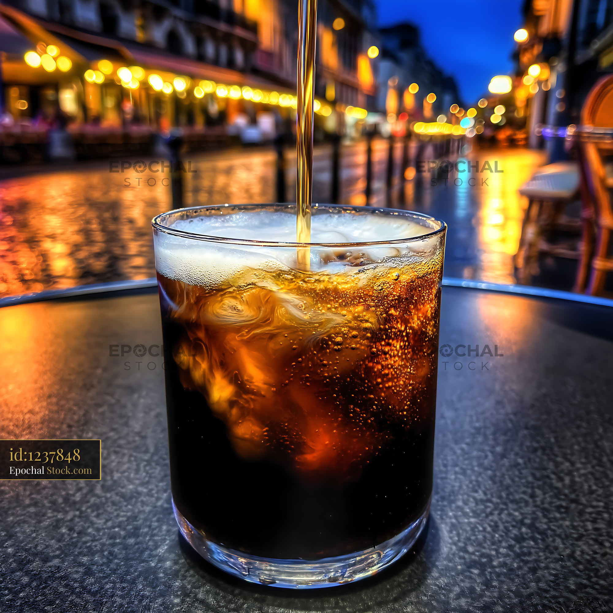 Nitro Caramel Coffee Poured at Dusk - stock photo
