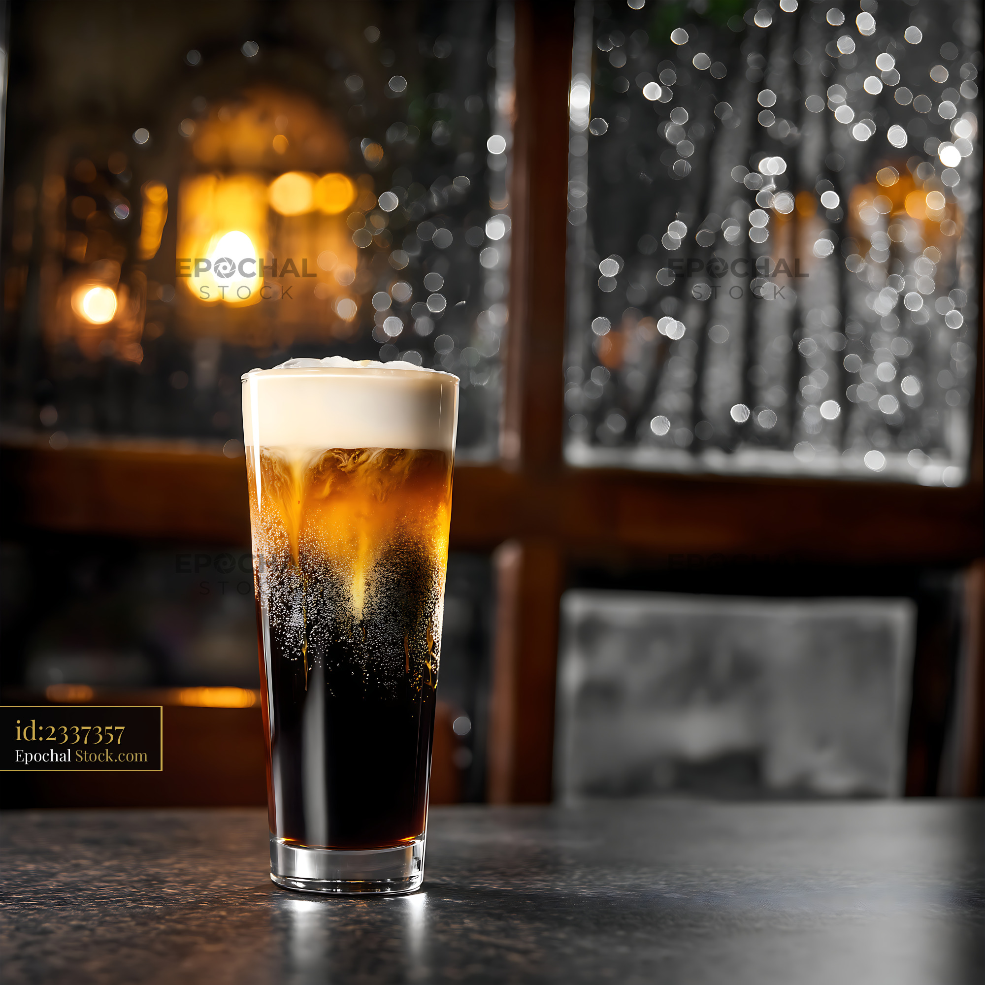 Nitro Caramel Coffee with Creamy Head and Rain - stock photo