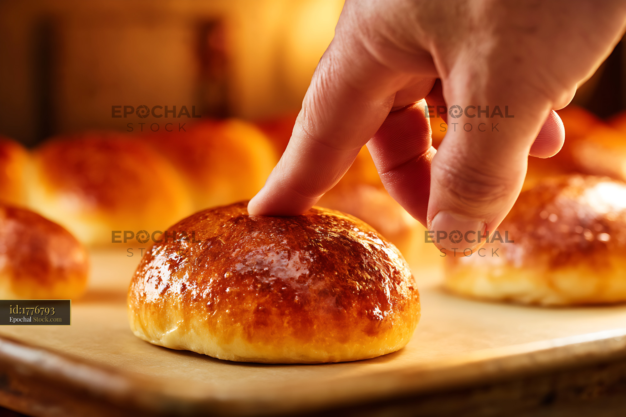 Fresh Baked Bread Roll Being Touched - stock photo