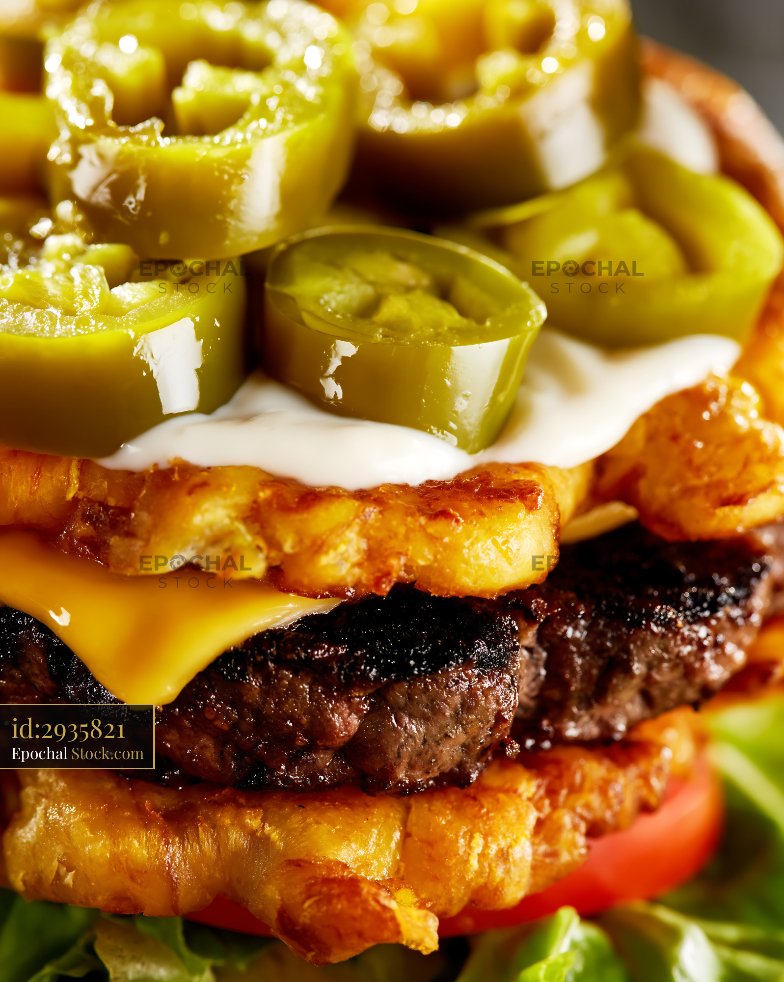 Jibarito Burger with Melted Cheese, Olives, and Fried Plantain Bun - stock photo