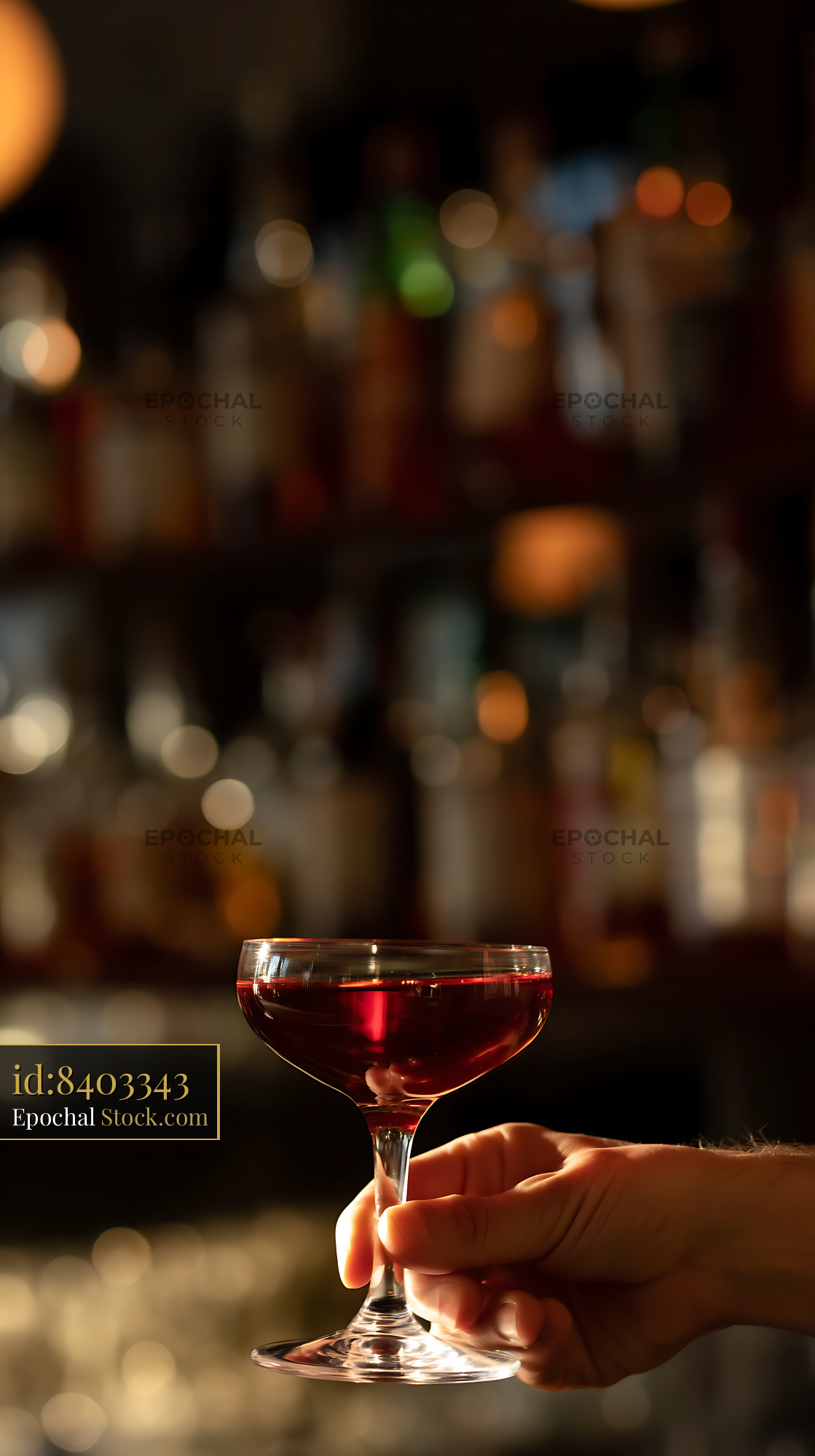 Bushwick Cocktail in Hand at Bar - stock photo