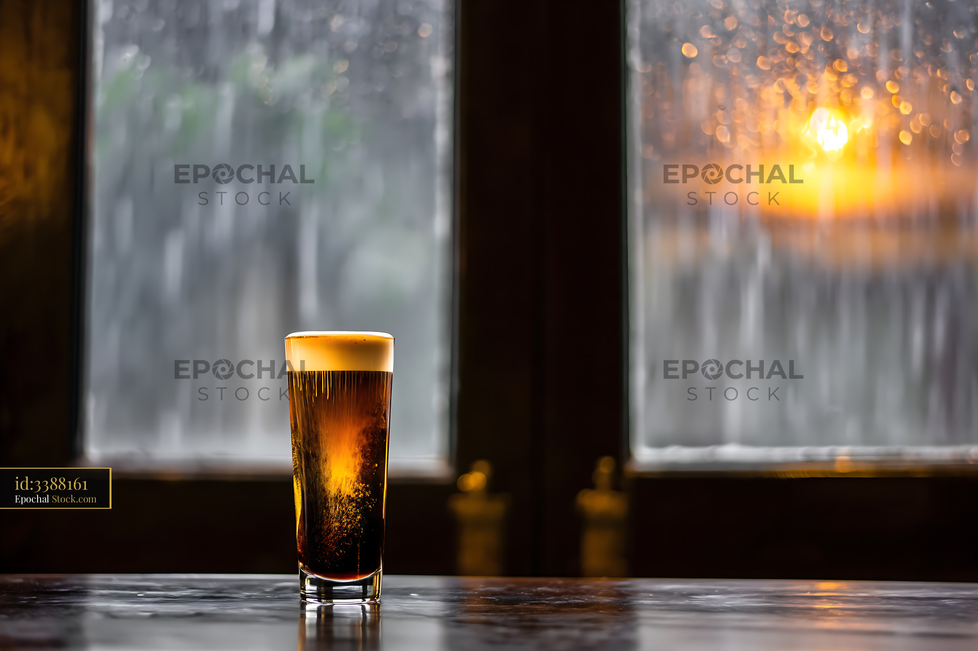 Nitro Caramel Coffee by Rainy Window - stock photo