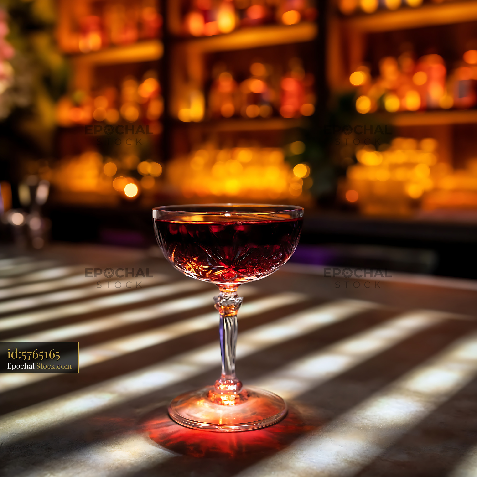 Bushwick Cocktail in Coupe Glass with Bar Backdrop - stock photo