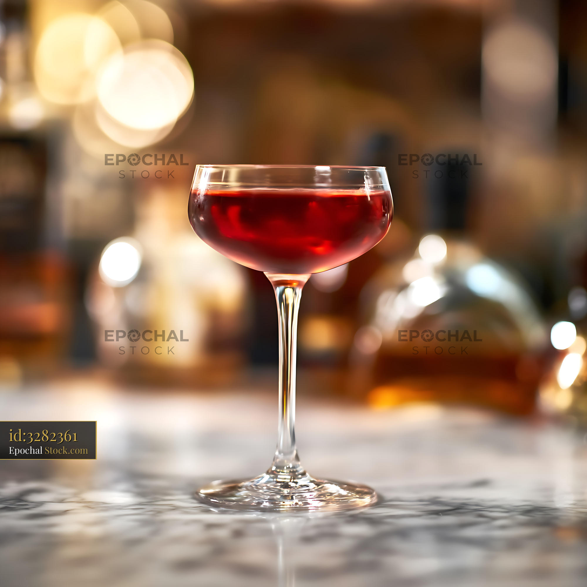 Bushwick Cocktail in Coupe Glass on Marble Bar - stock photo