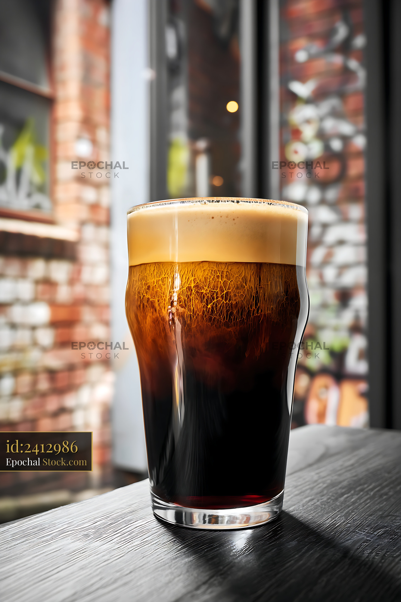 Nitro Caramel Coffee on Wooden Table - stock photo