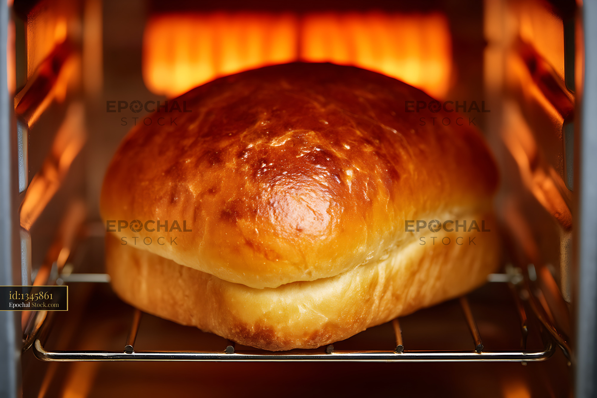 Golden Artisan Bread Baking in Hot Oven - stock photo