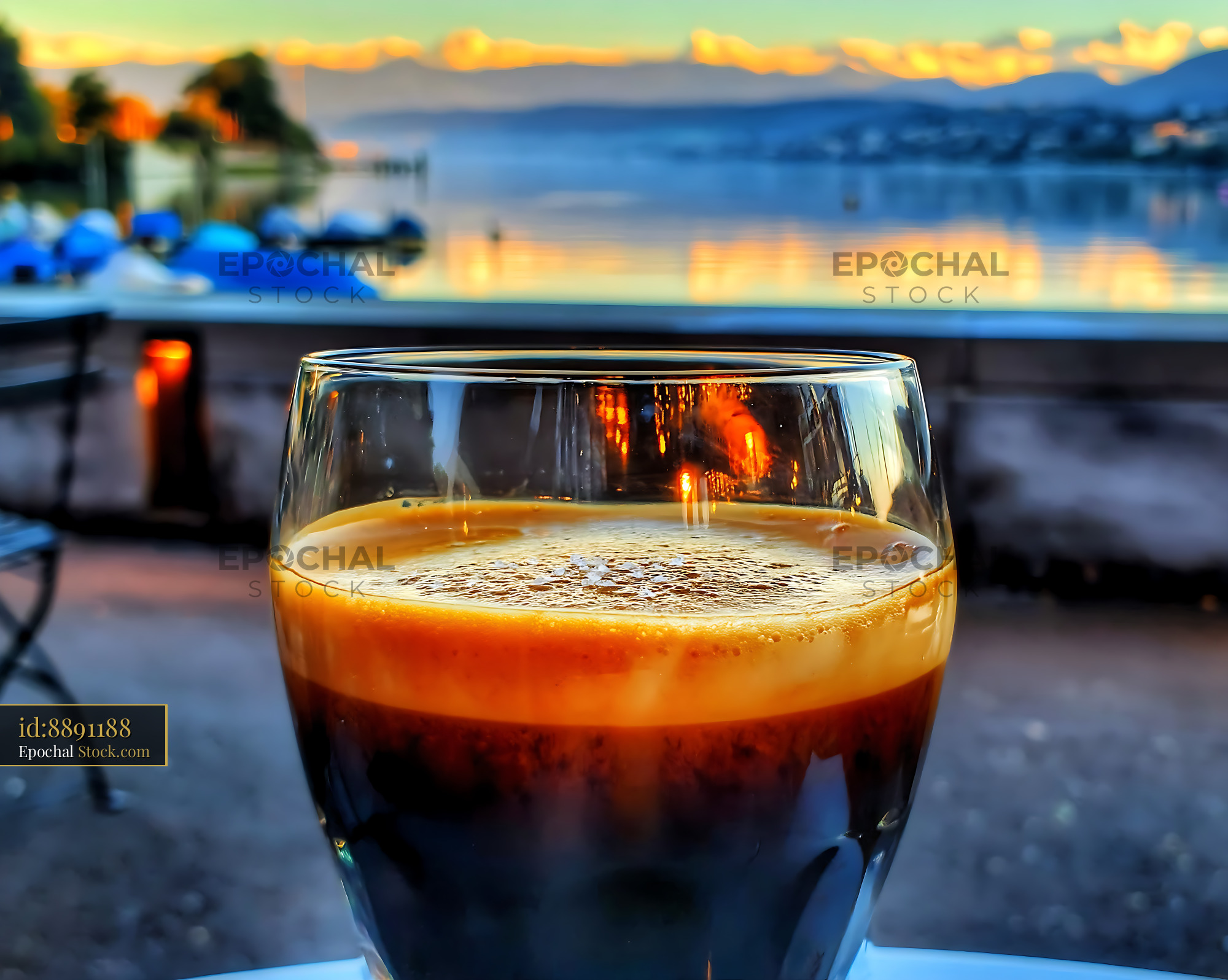 Nitro Caramel Coffee at Sunset Lakeside View - stock photo