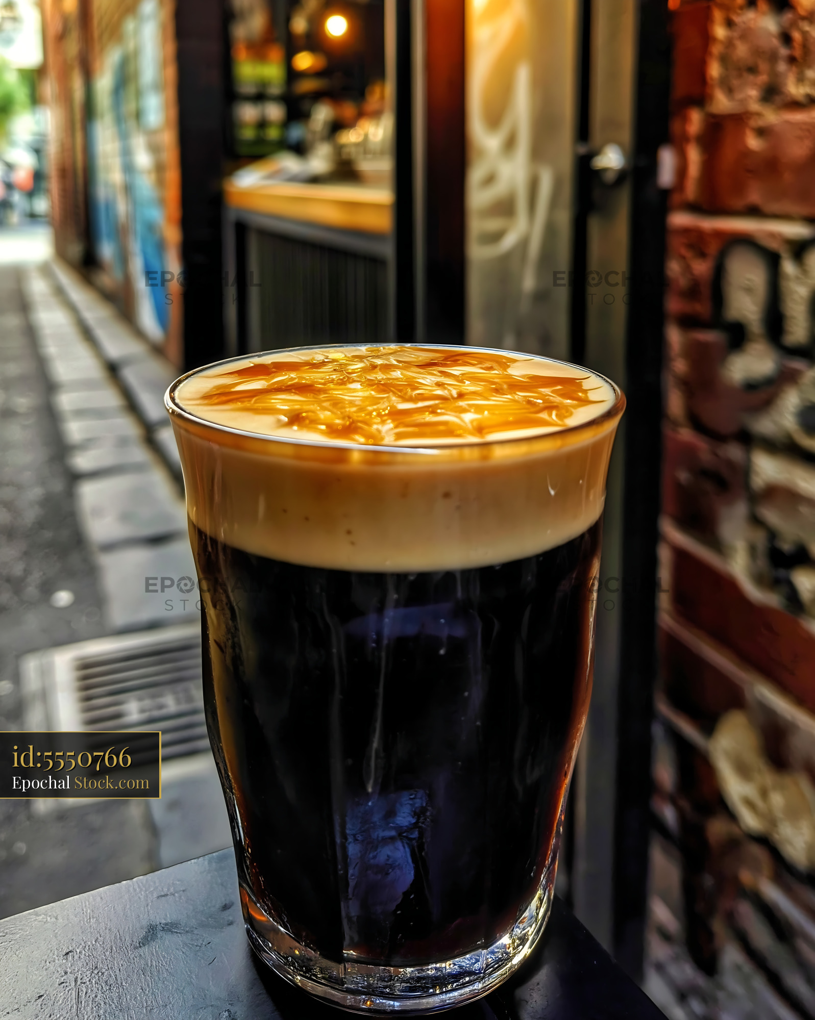 Dark Beer Pint on European Cobblestone Street - stock photo