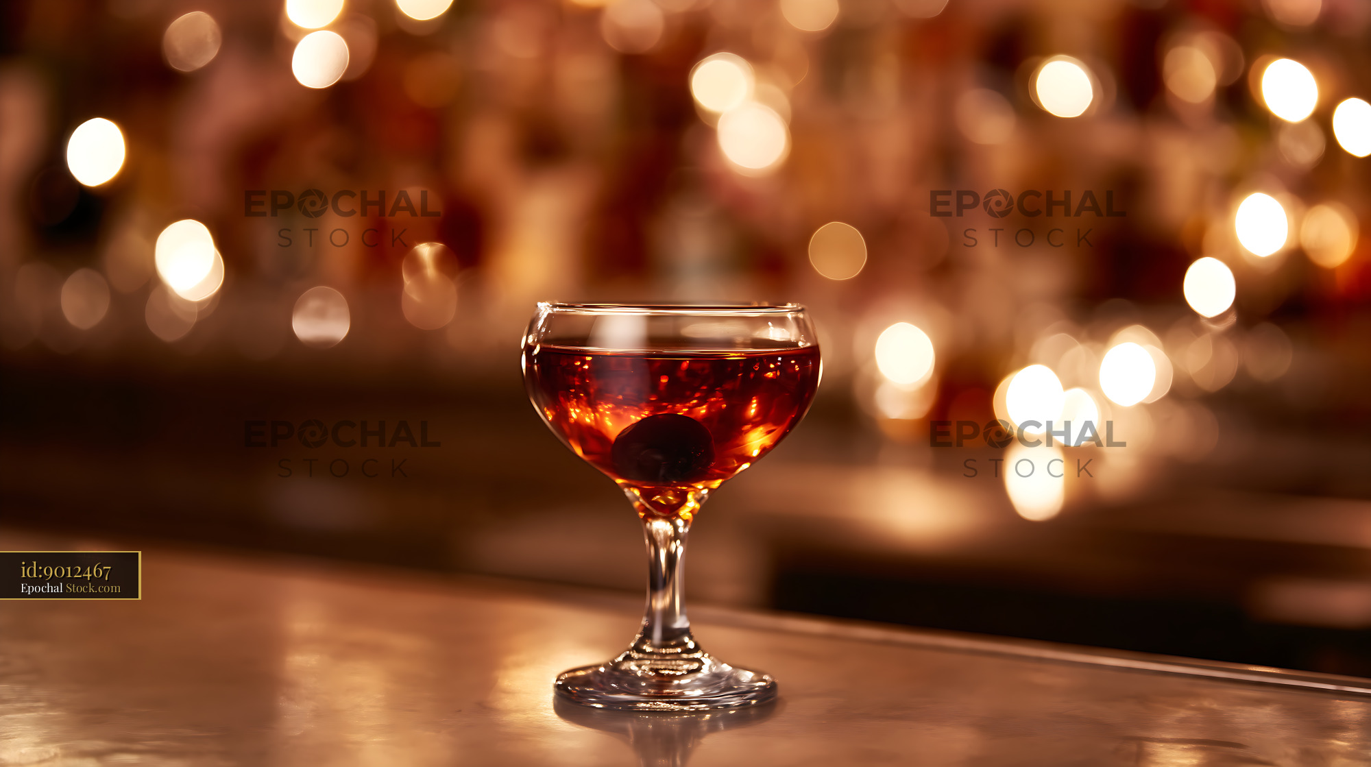 Bushwick Cocktail in Coupe Glass on Bar Counter - stock photo