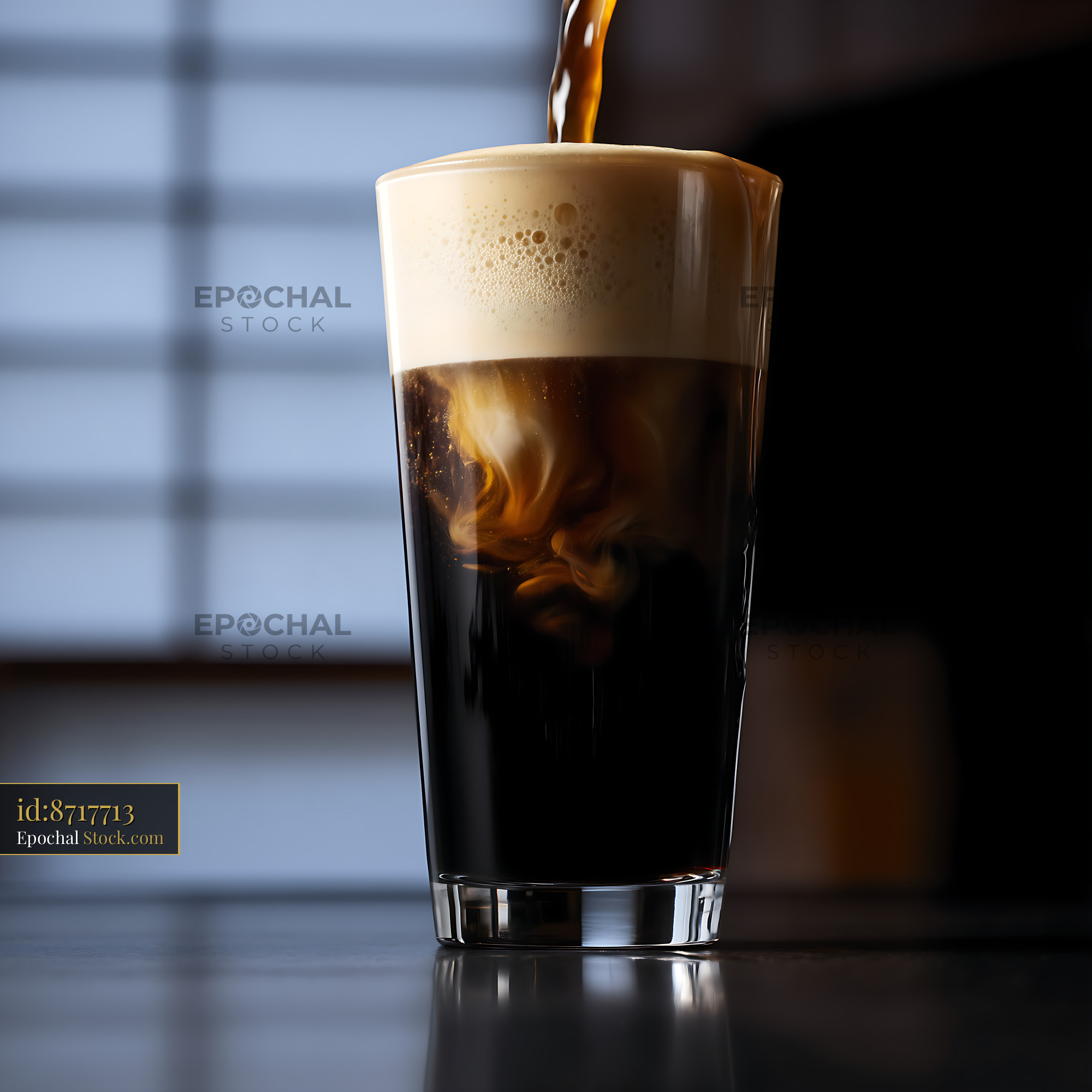 Nitro Caramel Coffee Being Poured - stock photo