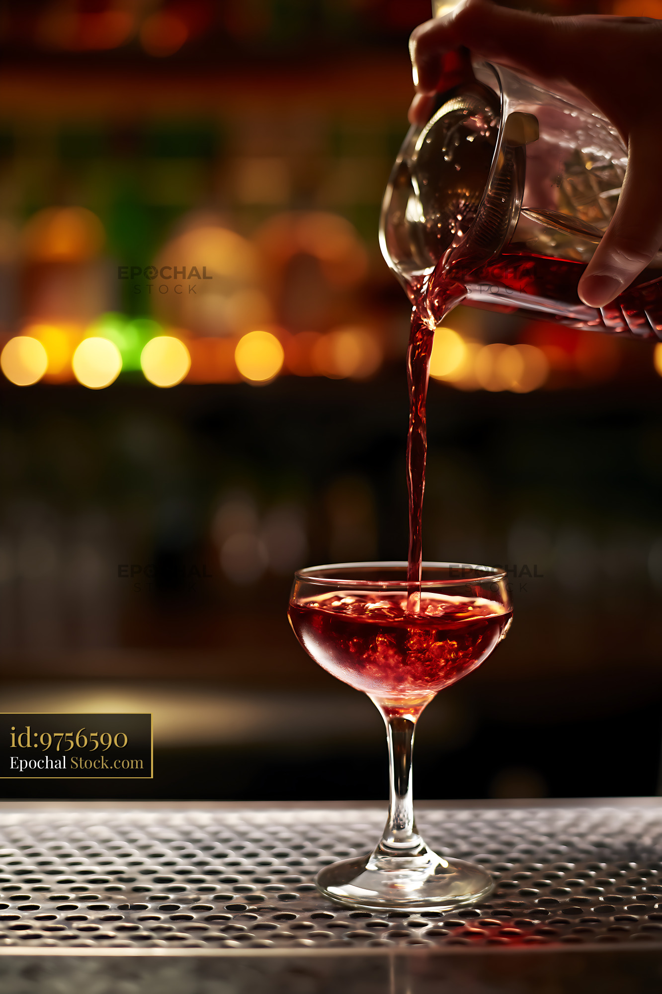 Bushwick Cocktail Pouring Into Coupe Glass - stock photo