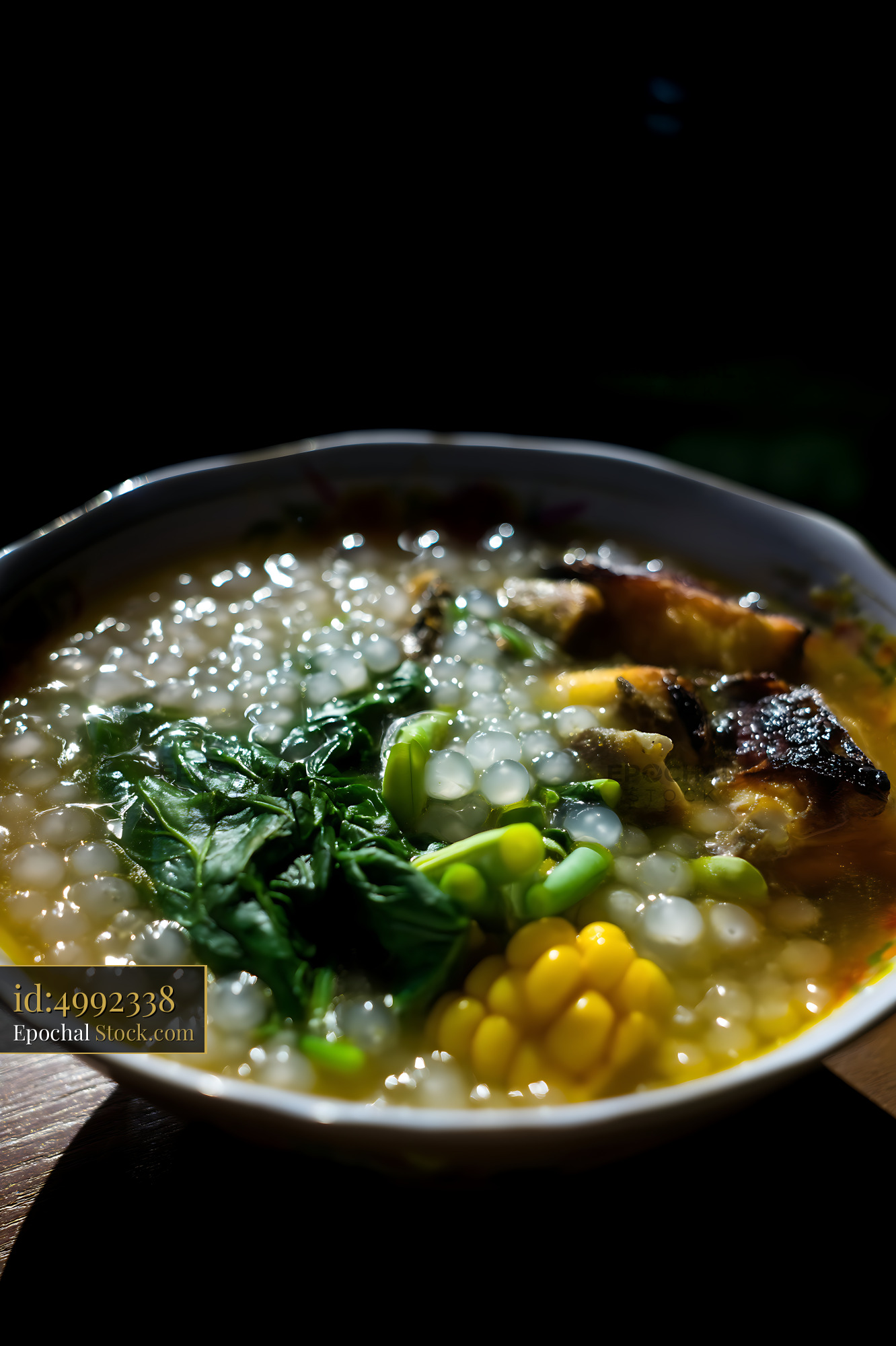 Hearty Lor Mee Soup with Corn, Greens, and Tapioca - stock photo