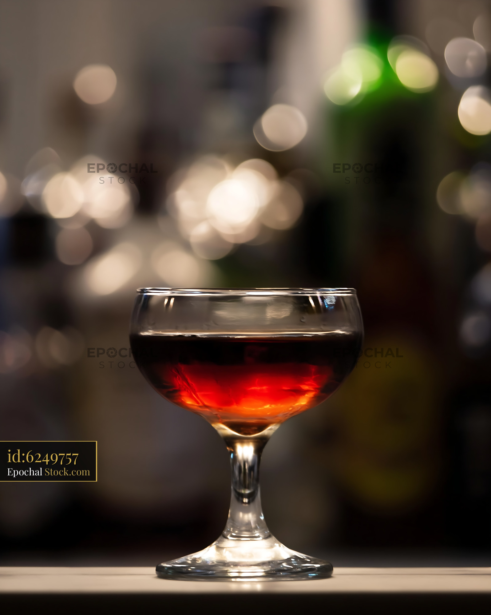 Elegant Red Cocktail in Coupe Glass - stock photo