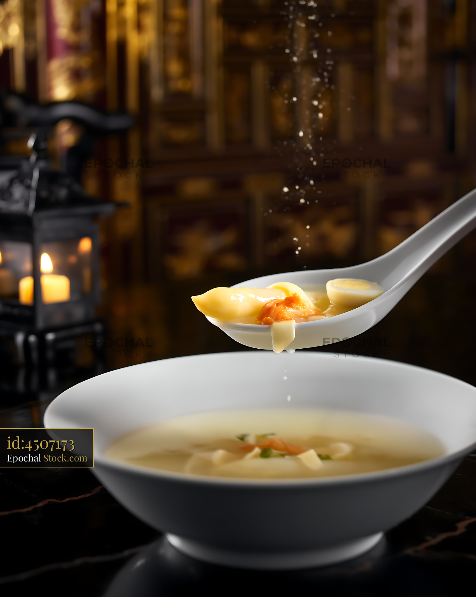 Sup Mang Cua Soup Spooned with Shrimp, Wontons - stock photo