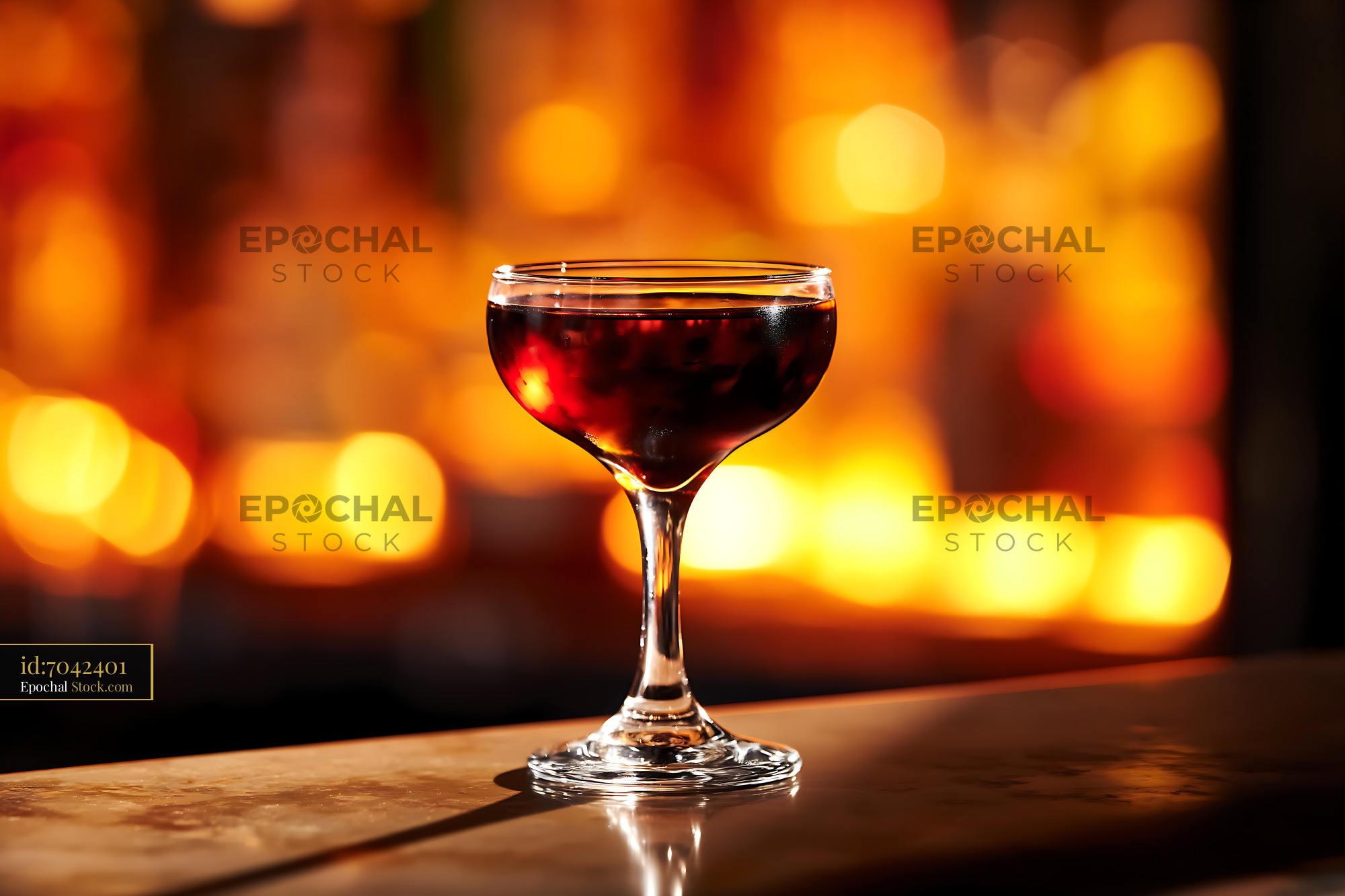 Bushwick Cocktail in Coupe Glass at Bar - stock photo