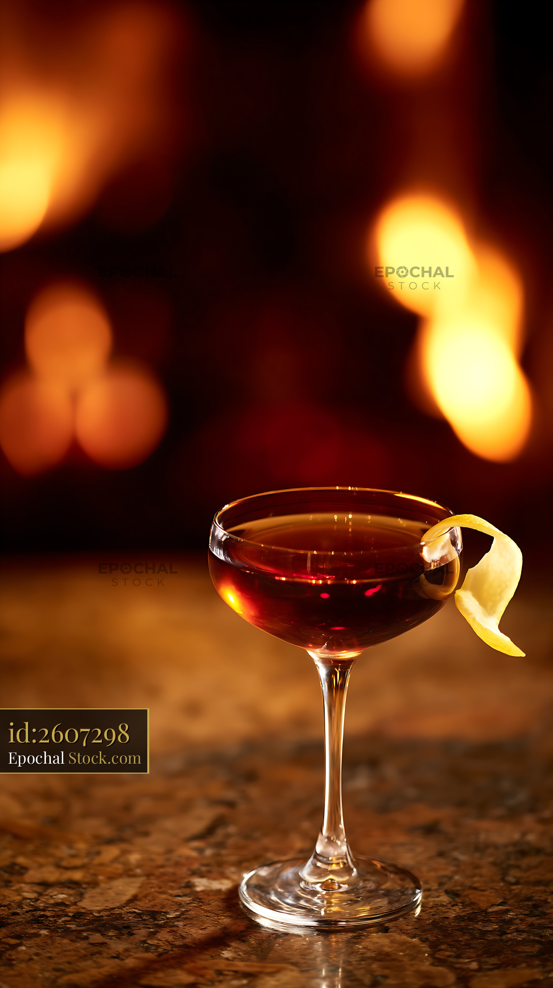 Saratoga Cocktail with Lemon Twist, Golden Bokeh - stock photo