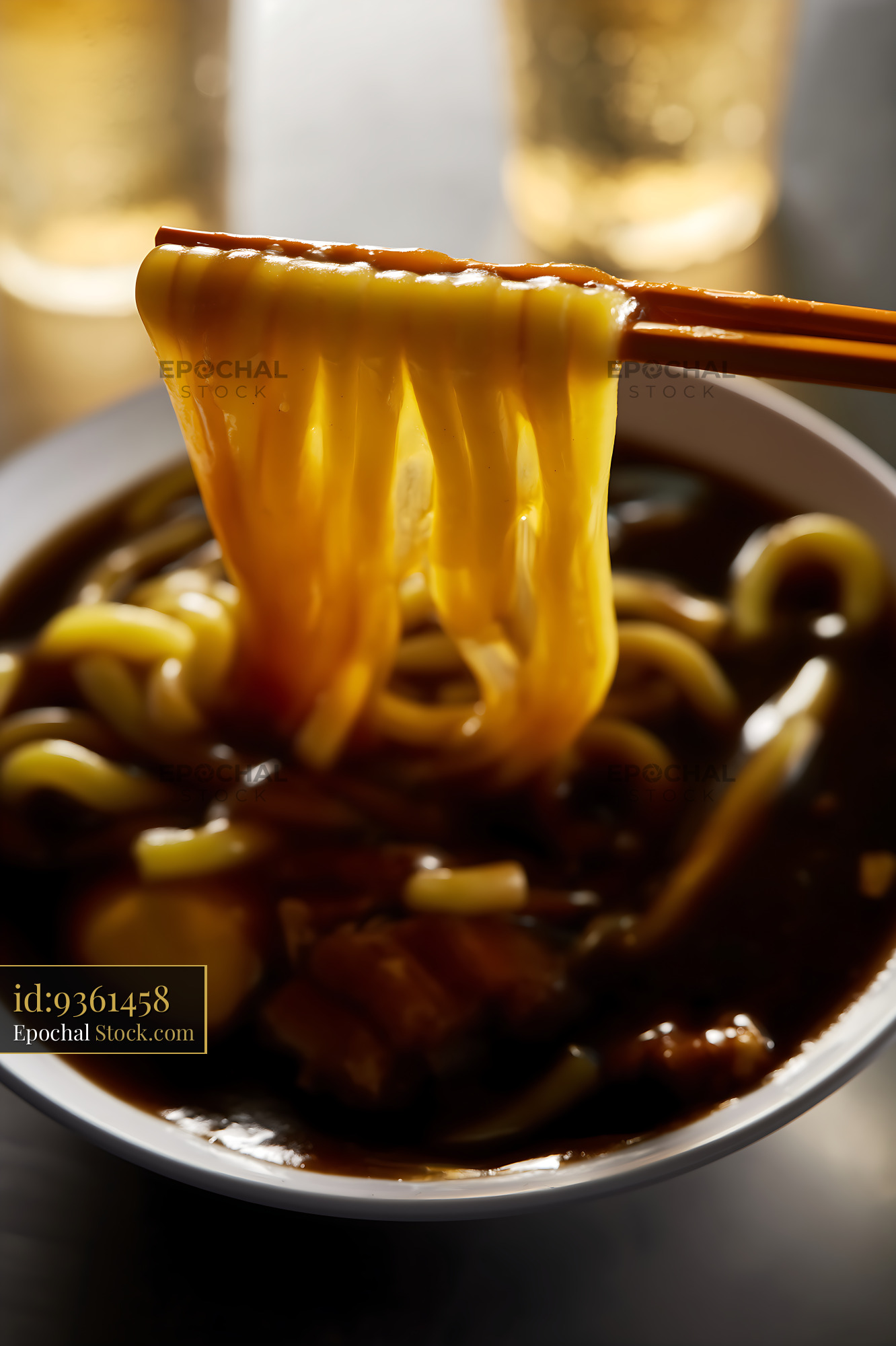Chopsticks Lifting Lor Mee Soup Noodles from Bowl - stock photo