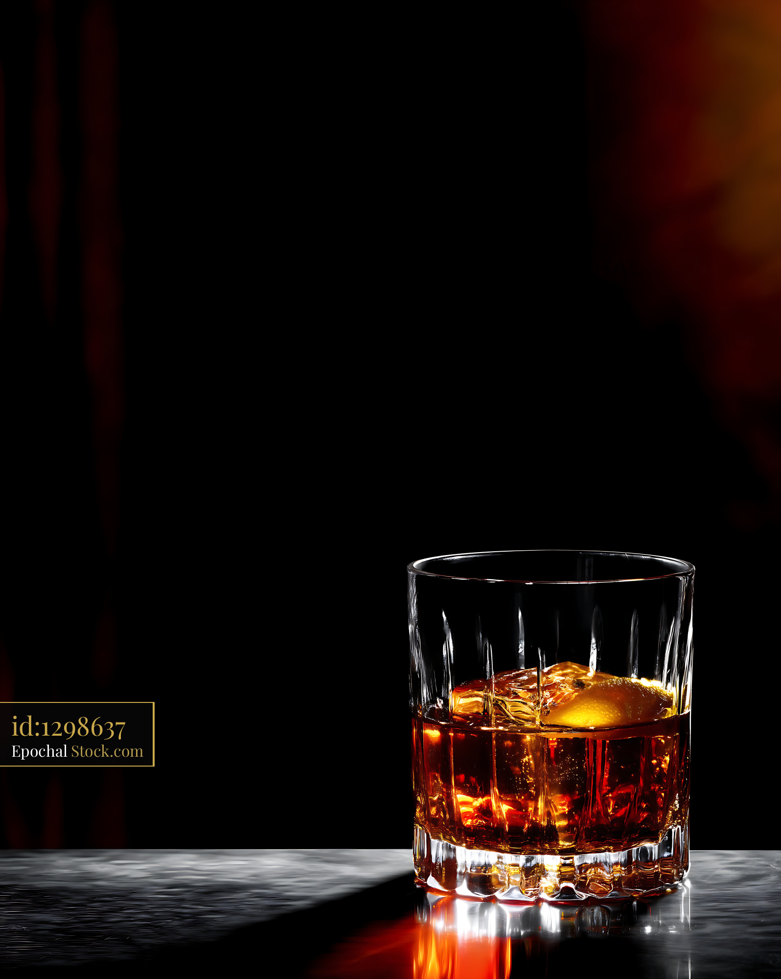 Saratoga Cocktail Glass with Ice, Dark Background - stock photo